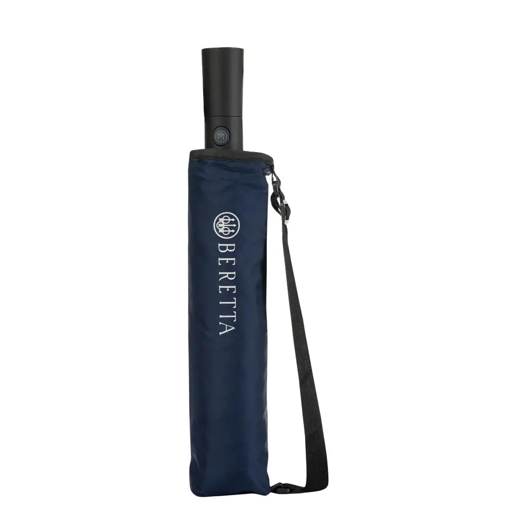 Closed navy Beretta Foldable Umbrella with carrying strap perfect for on-the-go style