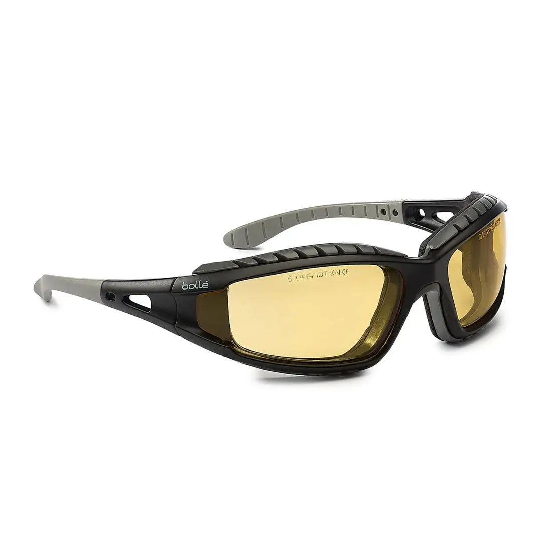 Black and gray Bolle Tracker safety glasses with yellow lenses for outdoor hunting gear