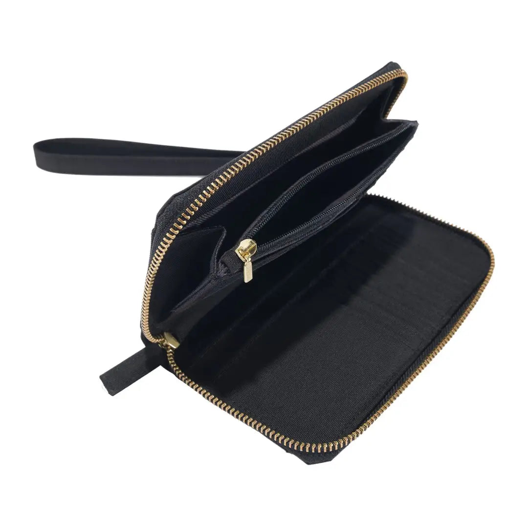 Open black clutch wallet with gold zipper from Carhartt Nylon Duck for country clothing and hunting