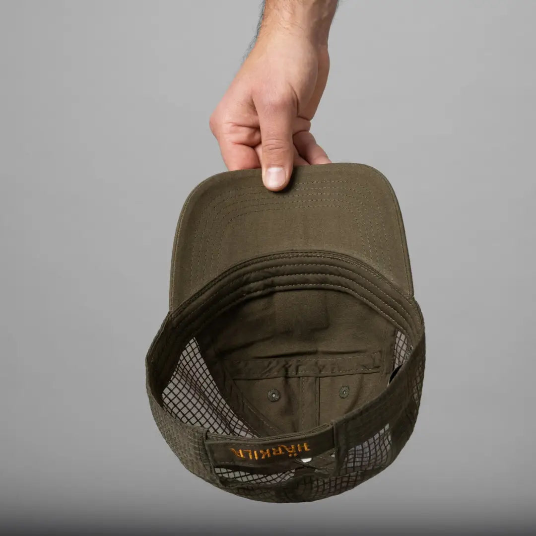 Green mesh-backed Harkila Instinct Cap for stylish country clothing and hunting