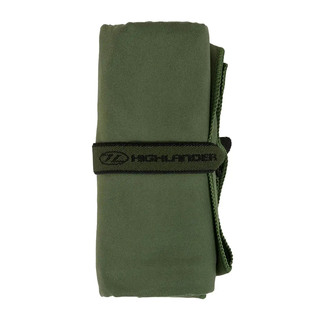 Rolled-up Highlander Fibre Soft Microfibre Towel with black strap for country clothing or hunting