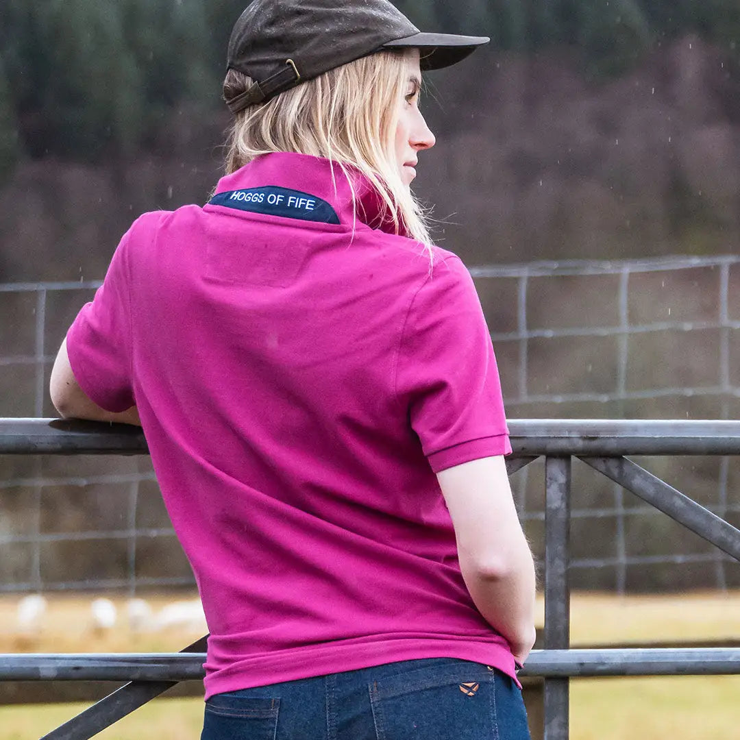 Magenta polo shirt from Hoggs of Fife Cora Ladies Pique collection, perfect for casual wear