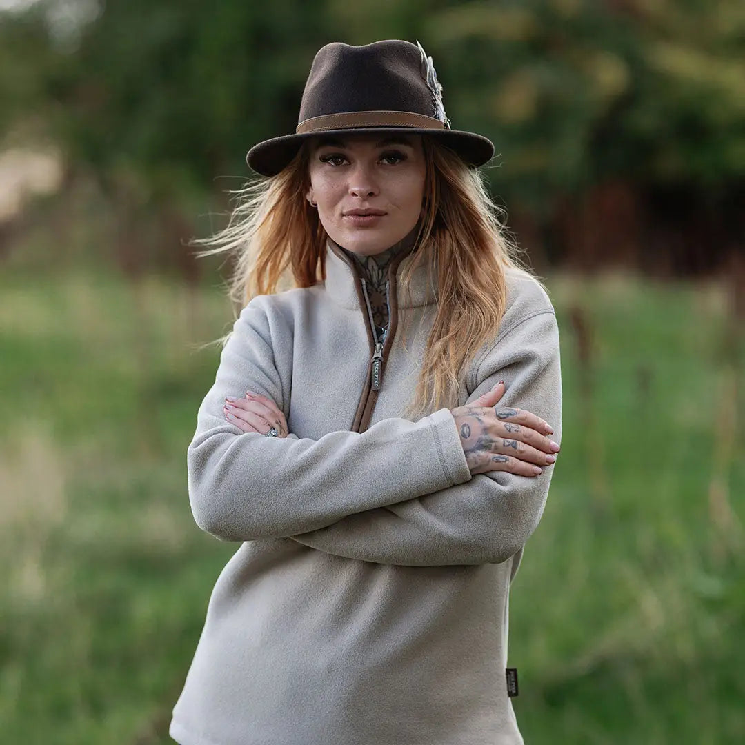 Jack Pyke Ladies Countryman beige fleece jacket with brown trim and fedora