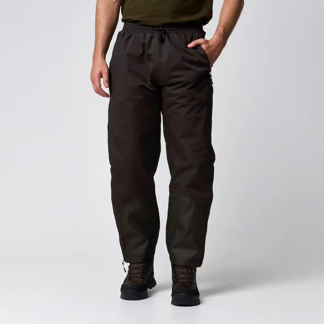 Jack Pyke Technical Featherlite Trousers in dark olive green, lightweight waterproof suit