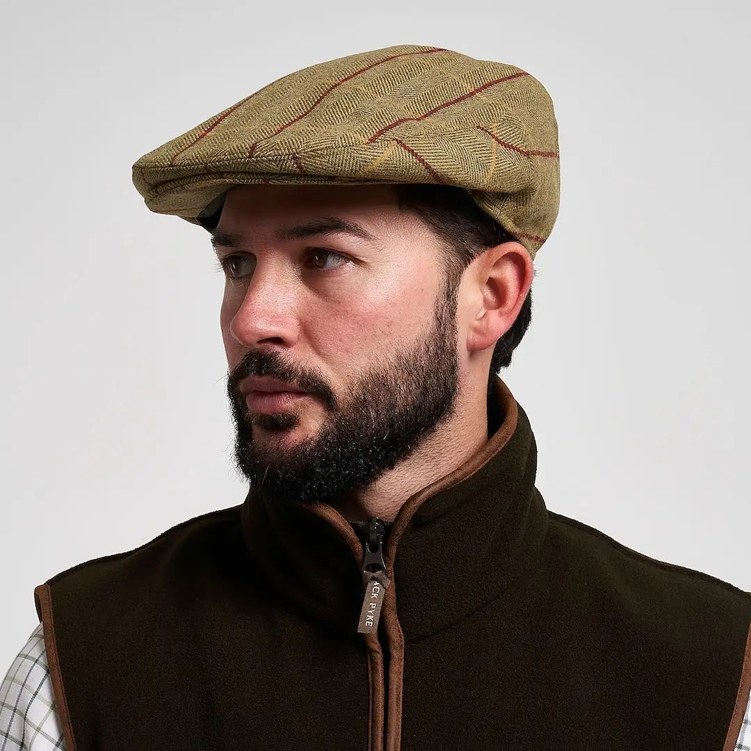Jack Pyke wool blend flat cap in tan herringbone tweed with red brown accents