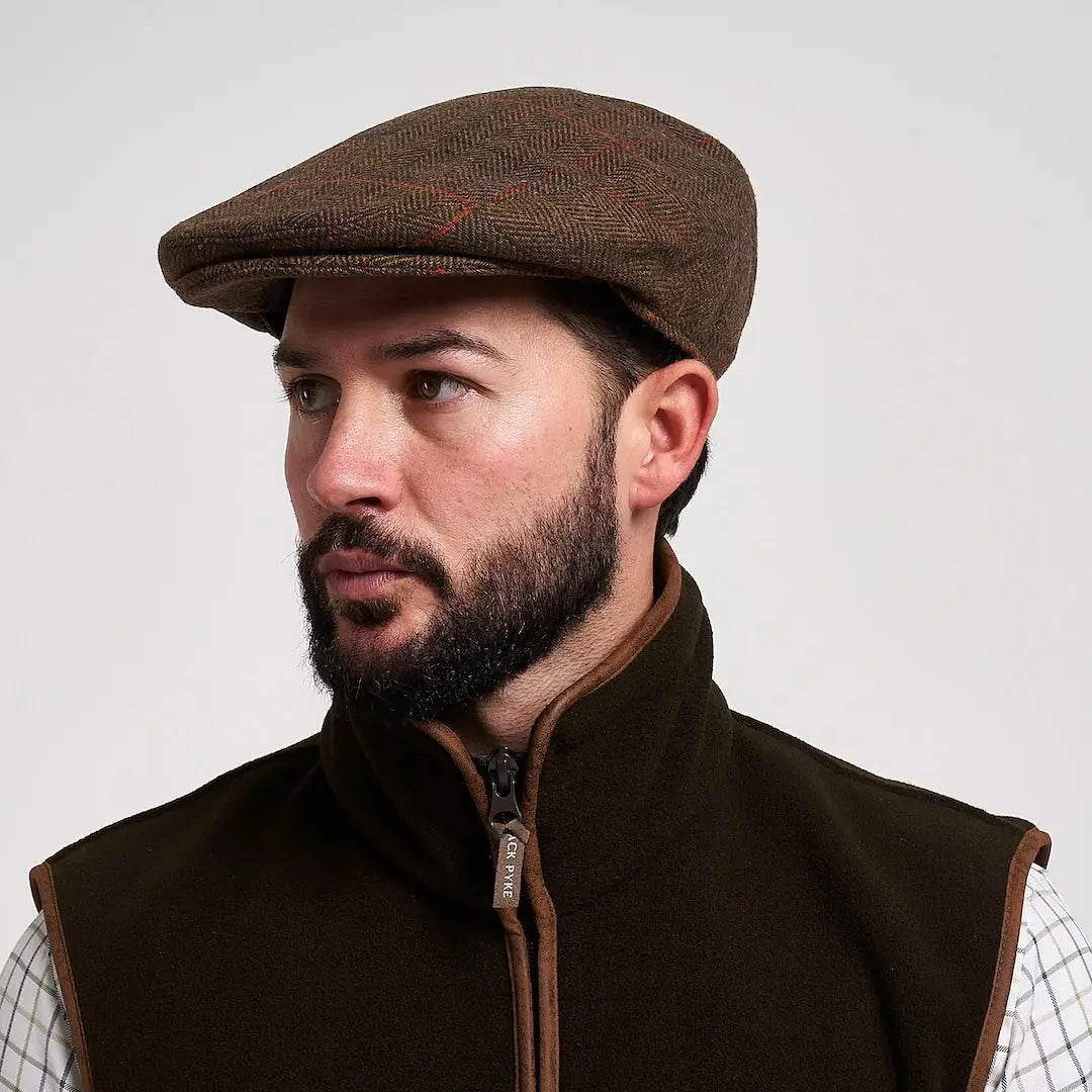 Jack Pyke wool blend flat cap in brown tweed herringbone pattern