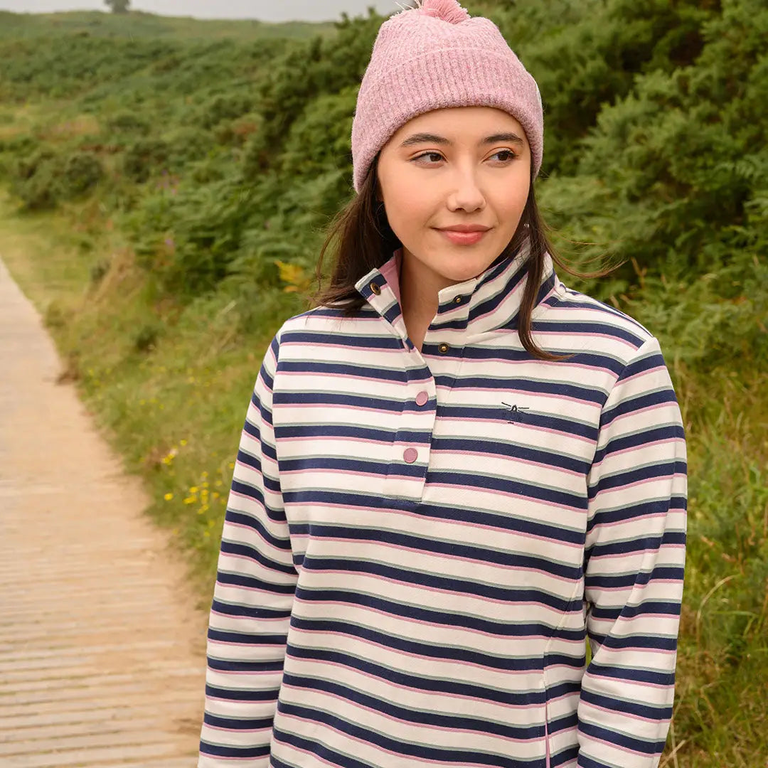 Woman wearing pink pom-pom beanie and striped top in Lighthouse Ladies Haven II Jersey