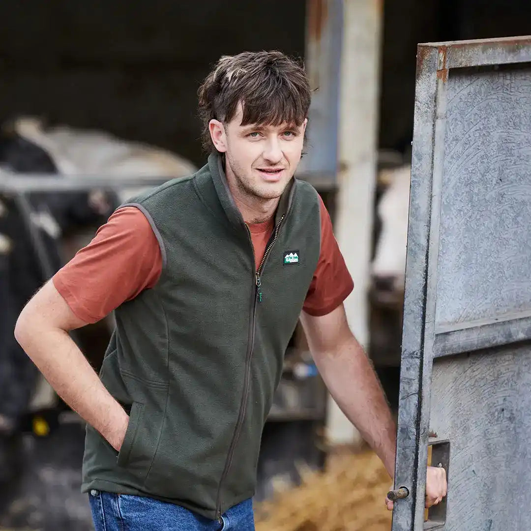 Olive green fleece vest from the Ridgeline Kodiak Gilet for cozy outdoor adventures