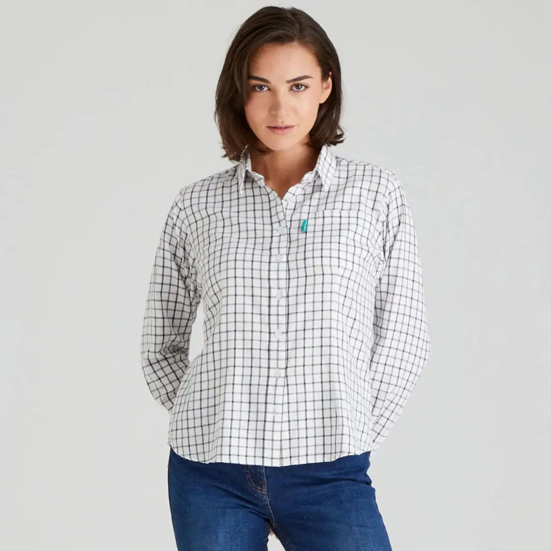 Ridgeline Womens Sedgebrook shirt worn by woman in checkered long-sleeve and jeans