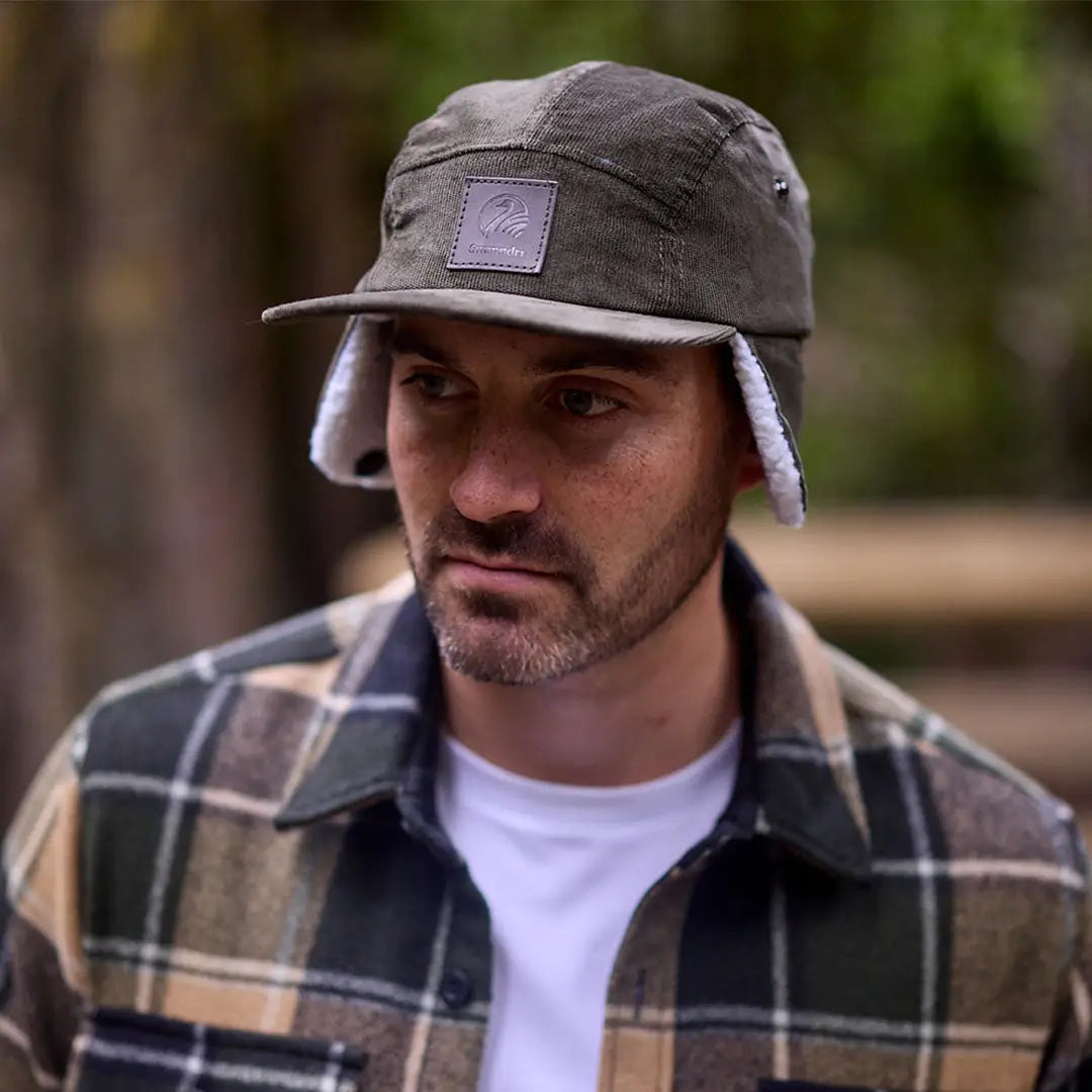 Swanndri Birchwood Sherpa lined cap with olive green trapper style and faux fur ear flaps