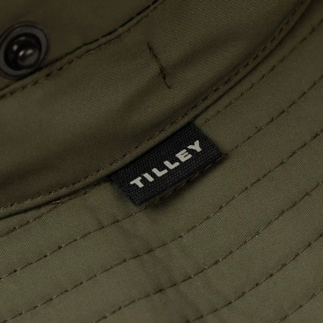 Olive green fabric with a black TILLEY label on the Tilley TWS1 All Weather Hat