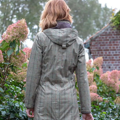 Gray plaid raincoat styled from behind, showcasing Baleno’s technical printed tweed design