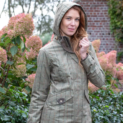 Woman wearing Baleno Twyford Ladies Printed Tweed Coat in olive green outdoors