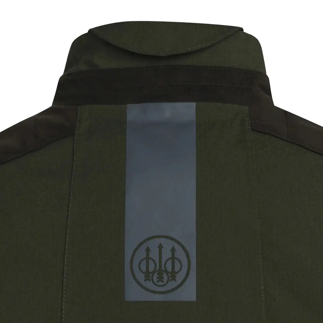 Green back of Beretta Teal Sporting EVO Jacket with a reflective stripe for safety