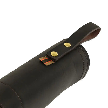 Dark leather cylindrical gun case with strap for hunting or country clothing style