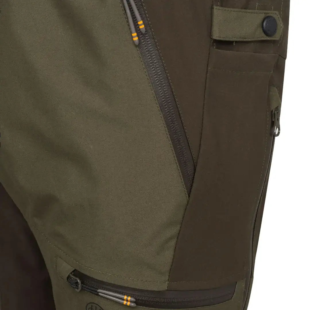 Olive green tri-active evo pants with zippered pockets for country clothing style