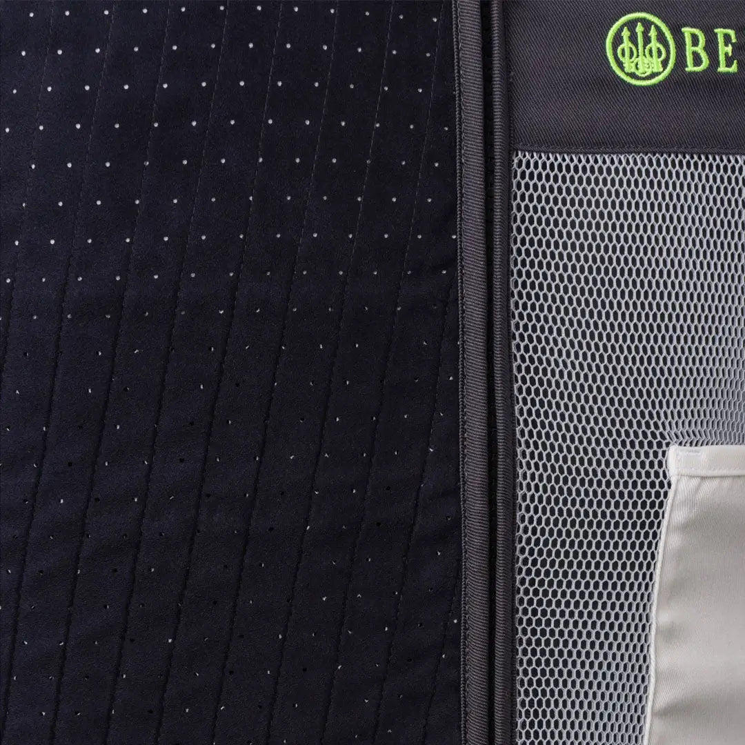 Beretta Uniform Pro vest slide with black quilted mesh, green logo, laser-cut pocket