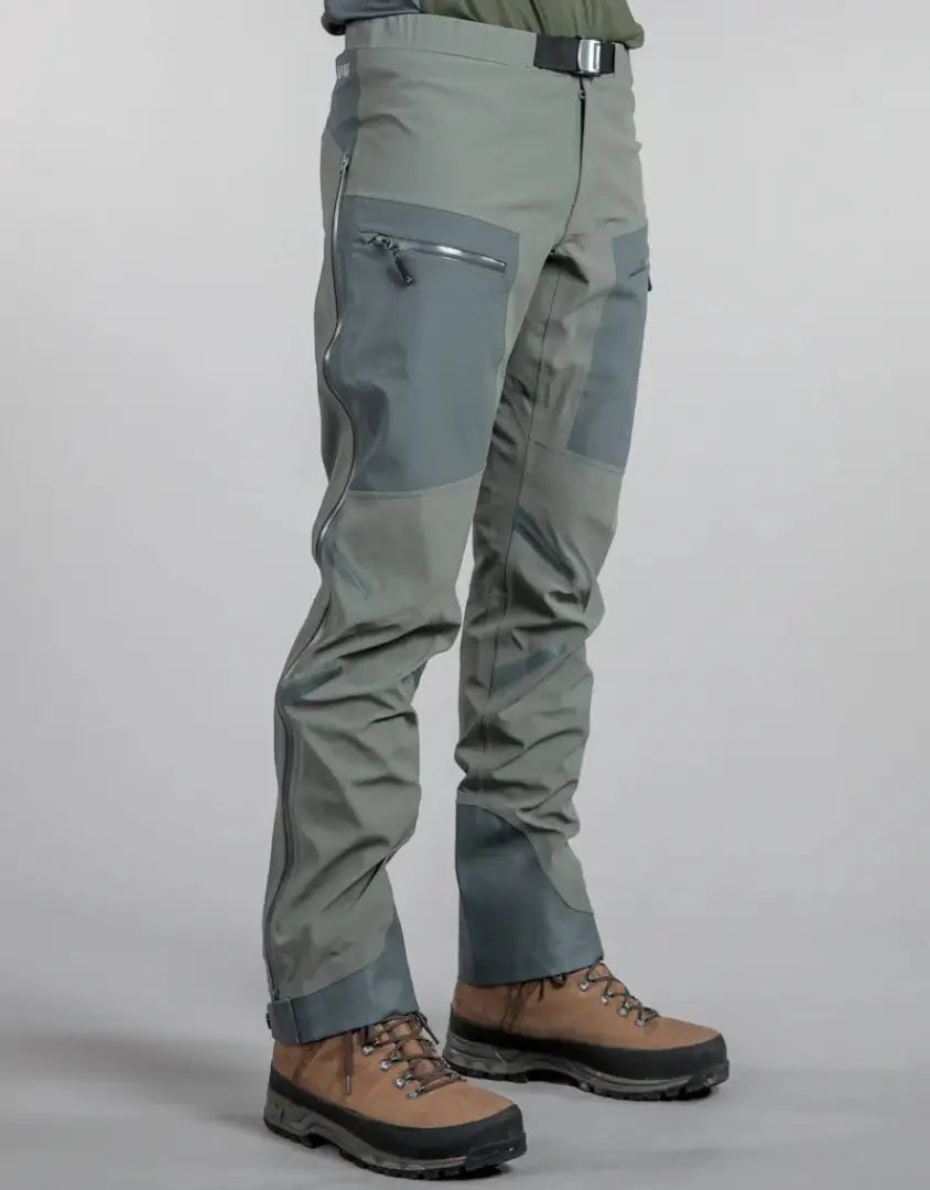 Gray hiking pants and brown boots from Bushbuck Alpine Waterproof Pants for hunting