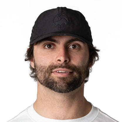 Bushbuck FoldIt Quick Dry Cap: black leather baseball hat with embossed logo