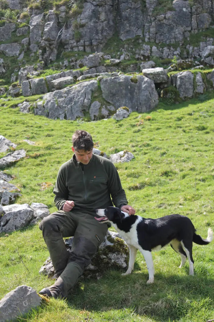 Man and border collie wearing Bushbuck Vertex Fleece Half Zip Fleece Half-Zip for outdoor fun