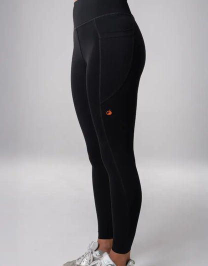 Bushbuck Womens Ascent Leggings: black high-waisted with orange logo for outdoors