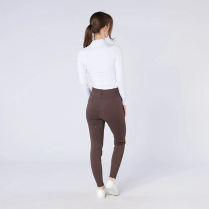 Woman modeling Cameo All Season Tights with white top and brown skinny pants for country clothing
