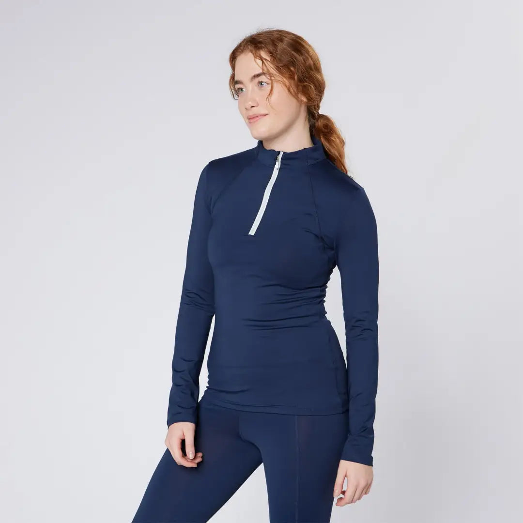Woman in navy athletic wear from Cameo Core Collection for country clothing and hunting