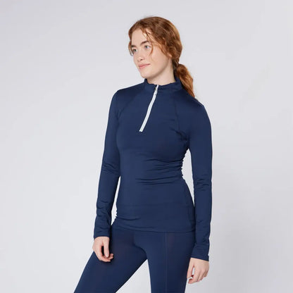 Woman in navy athletic wear from Cameo Core Collection for country clothing and hunting