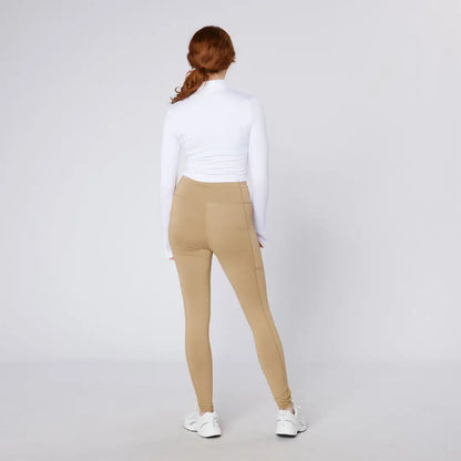 Woman wearing white top and tan Cameo Core Collection Tights for a stylish look