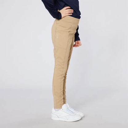 Cameo Junior Core Tights shown with tan pants and white sneakers in casual style