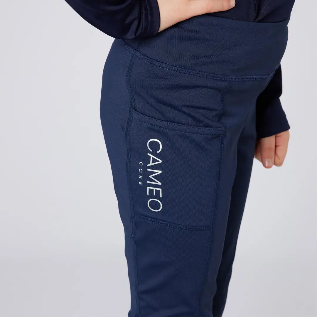 Navy cameo junior core tights with pockets, perfect for active kids