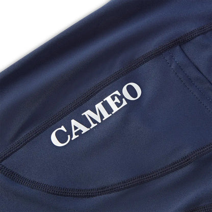 Navy athletic fabric with white lettering on Cameo Junior Performance Riding Tights for riding motos