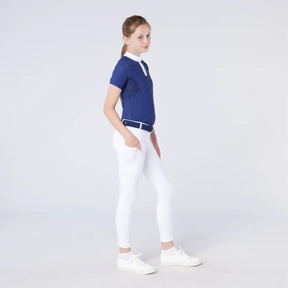 Girl in navy polo and white riding pants, perfect country clothing for outdoors riding
