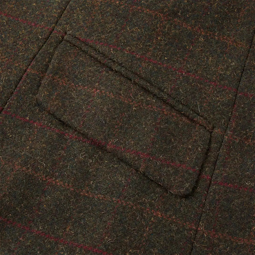 Close-up of Tweed jacket pocket with foxhead buttons from Cameo Junior Hunting Country Clothing