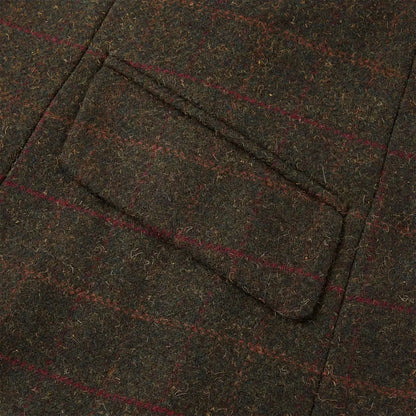 Close-up of Tweed jacket pocket with foxhead buttons from Cameo Junior Hunting Country Clothing