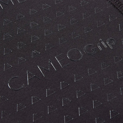 Close-up of black country clothing fabric with triangular pattern and Cameo Grip embossing