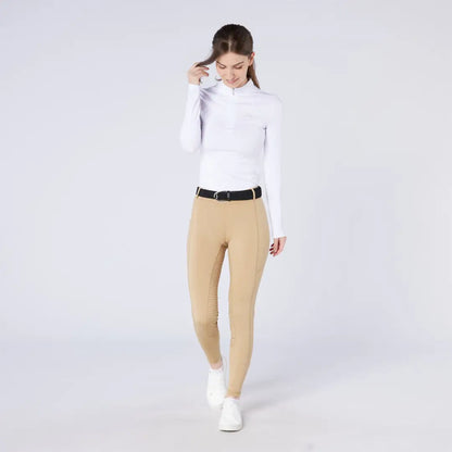 Women’s white long-sleeve equestrian top and tan riding pants for country clothing outdoors