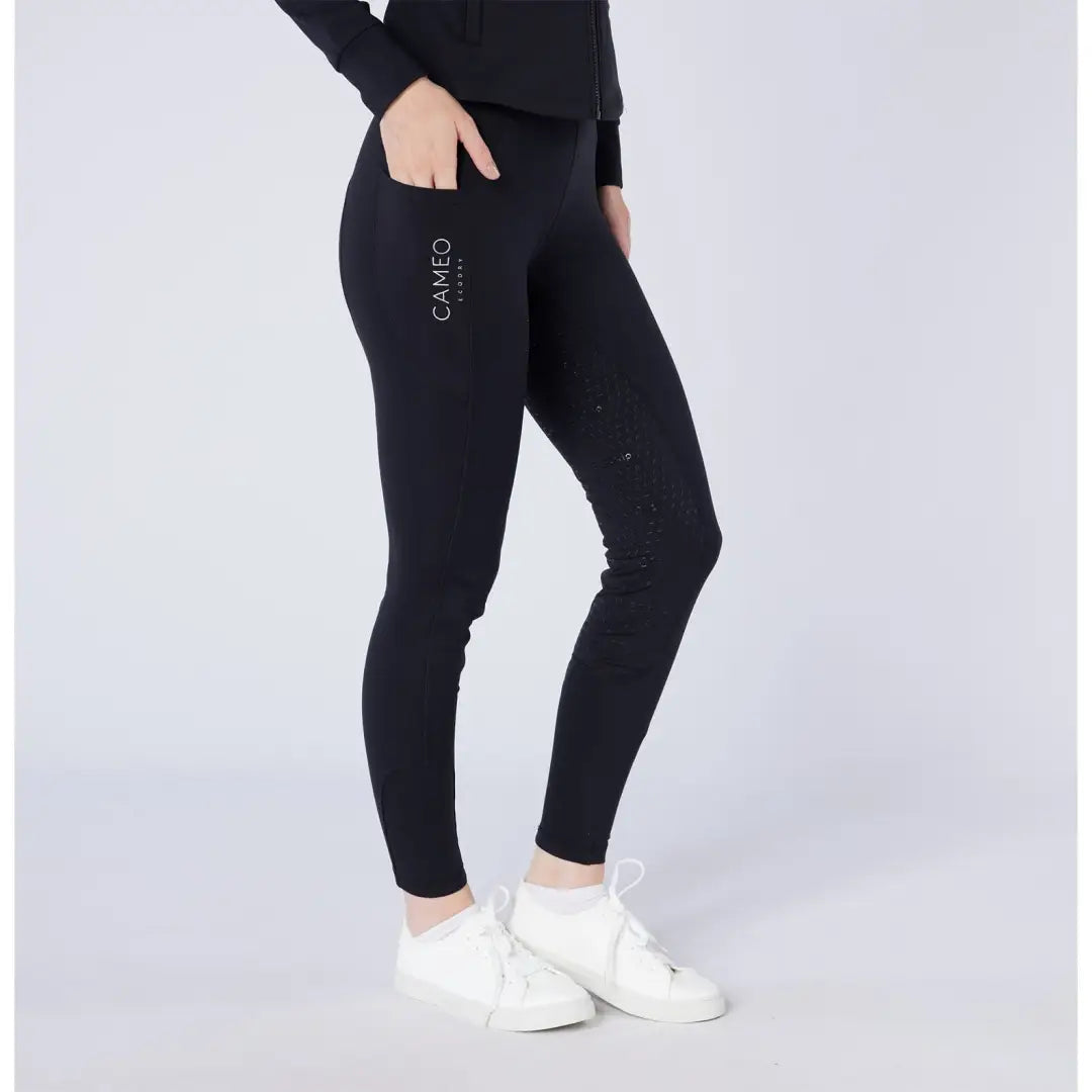 Black athletic leggings with side pocket and subtle embellishments for outdoor country clothing