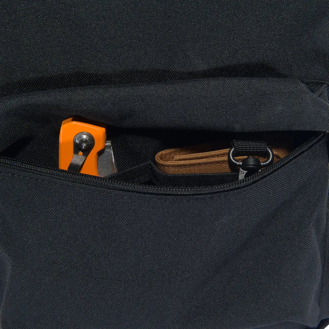 Black backpack pocket with wallet and knife for outdoor country clothing and hunting gear