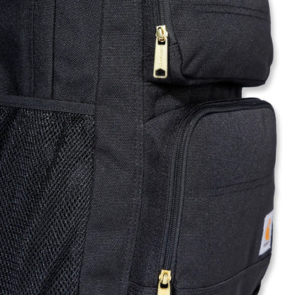 Black Carhartt 27L backpack with gold zippers and mesh pocket