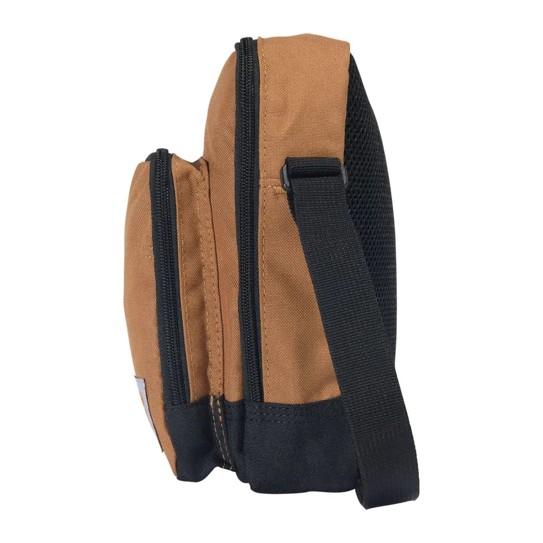 Brown Carhartt crossbody zip bag with black strap and zipper