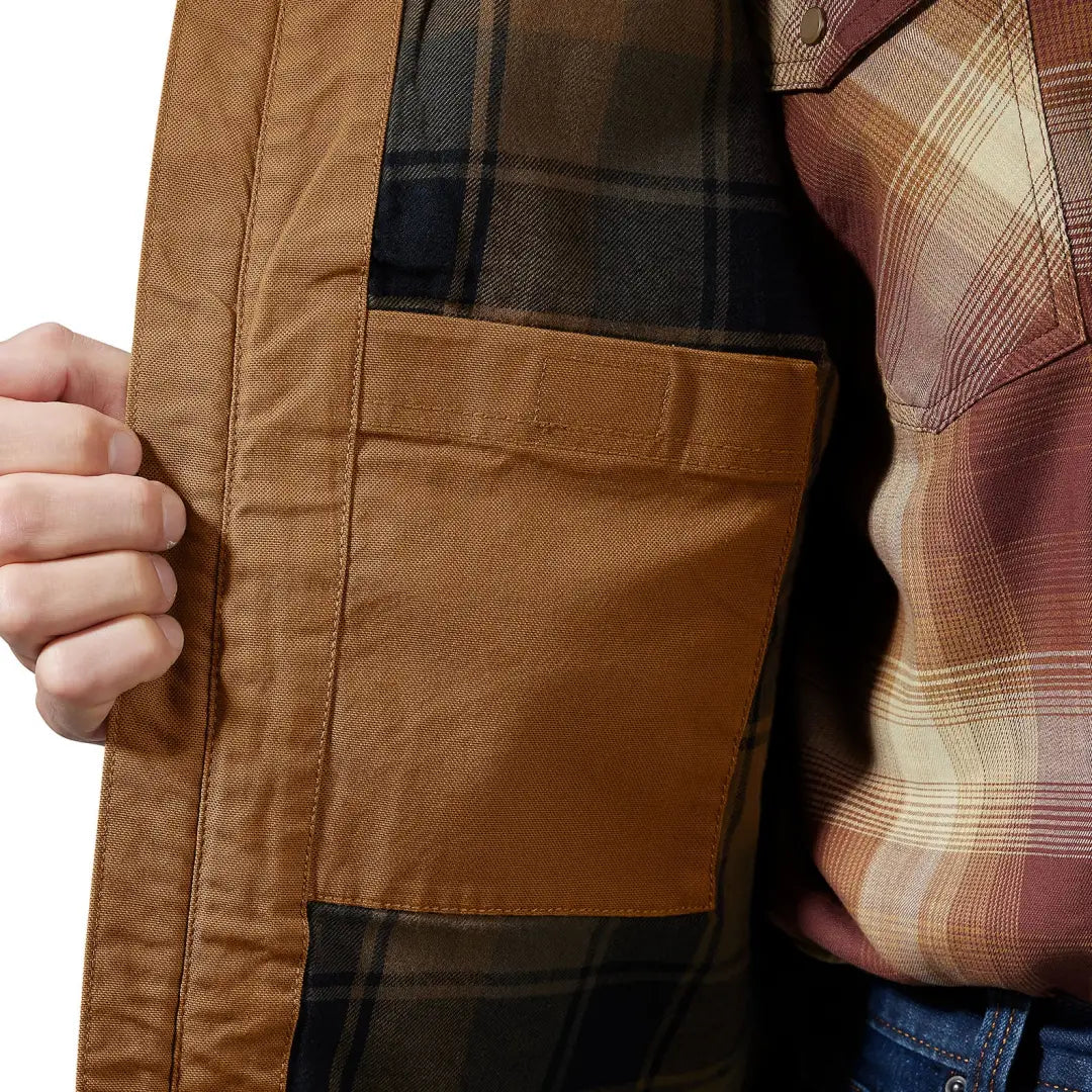 Carhartt Montana Relaxed Fit Duck Vest with brown jacket and plaid lining, great for country hunting