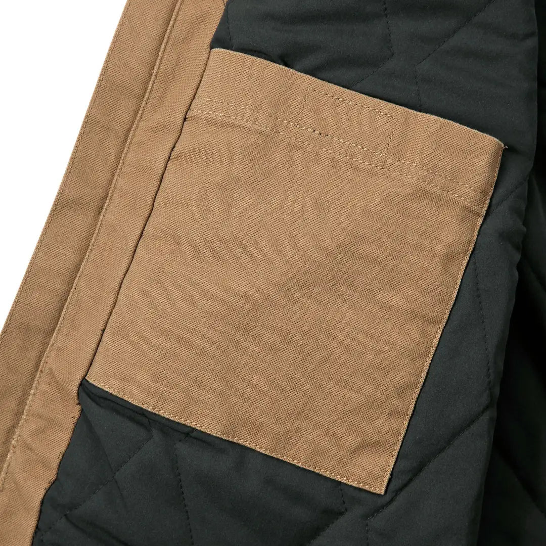 Tan jacket pocket on Carhartt Montana Rugged Flex relaxed fit duck vest for country hunting