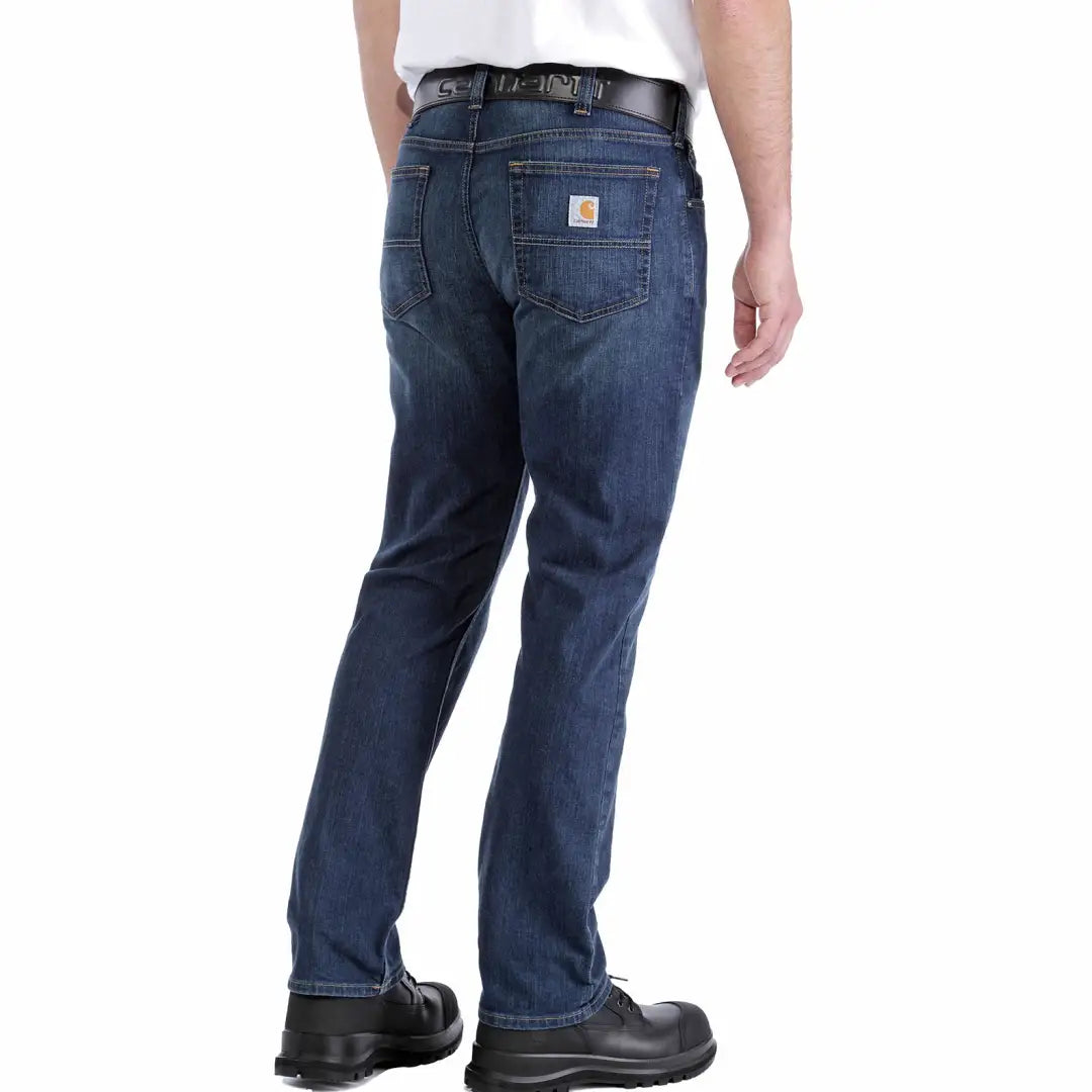 Carhartt relaxed straight work jeans in dark blue denim with back patch