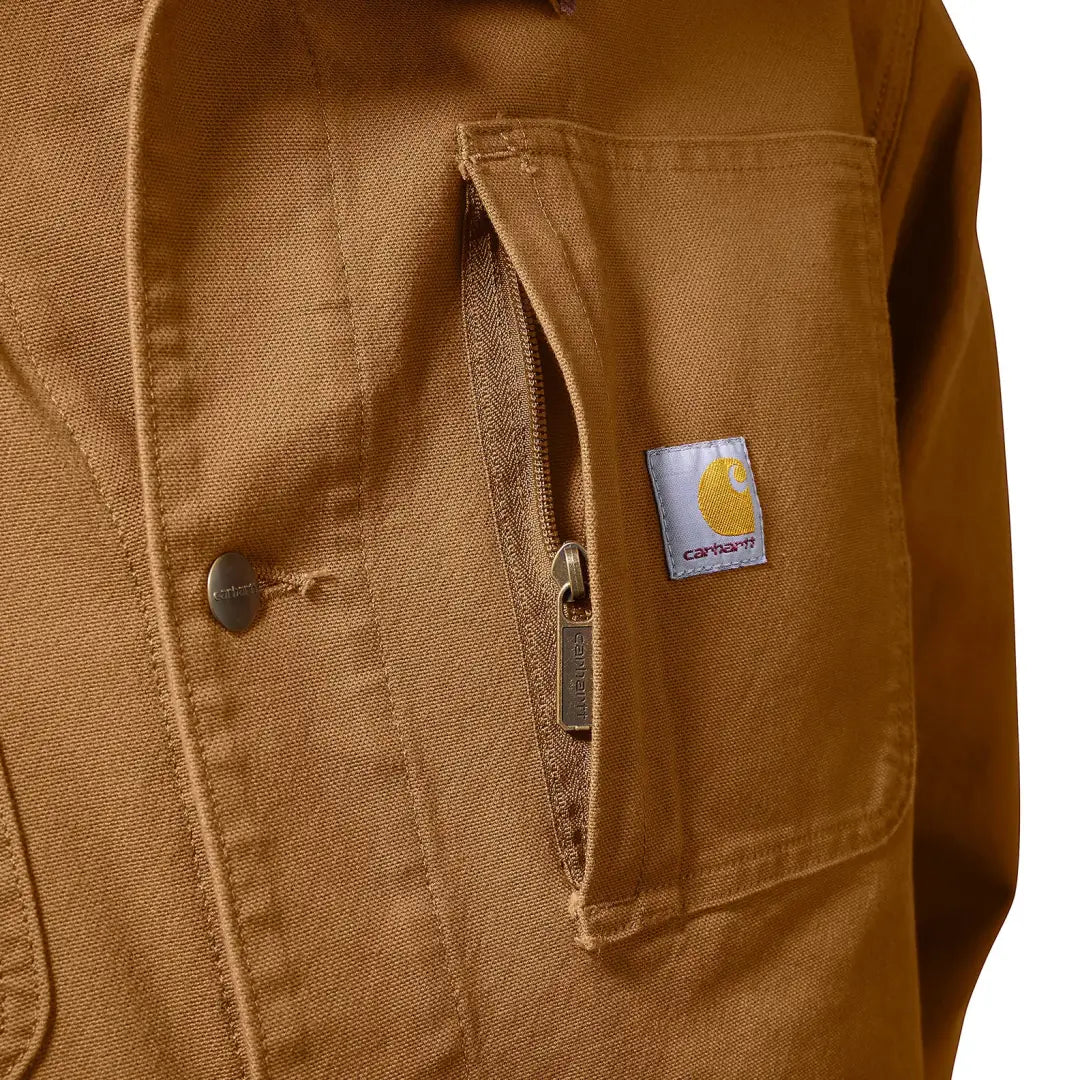 Brown Carhartt chore coat perfect for country clothing and hunting trips