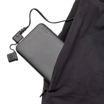 Portable battery charger in a pocket of Deerhunter Heat Long Johns for rechargeable heated long wear
