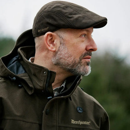 Brown flat cap and jacket from Deerhunter Pro Gamekeeper, perfect for country clothing and hunting