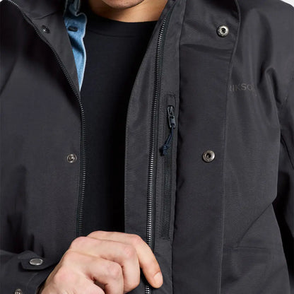Dark gray Didriksons Andreas Parka with zippers, snap buttons, and seven pockets for Nordic weather