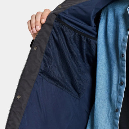 Partially open Didriksons Andreas Parka showing inner lining and blue shirt, perfect for Nordic weather