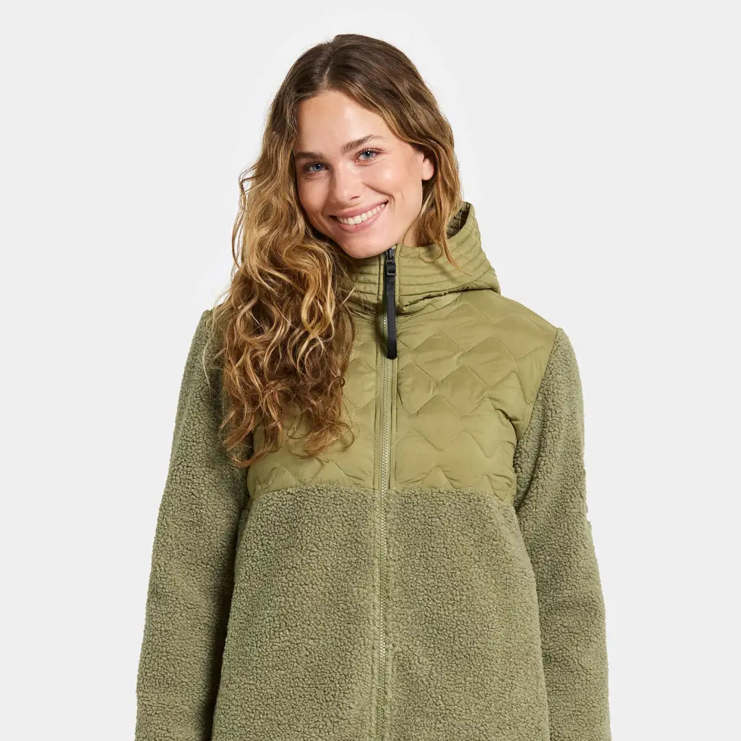 Woman in green fleece jacket from Didriksons Bibi 2 for country clothing and outdoors fun